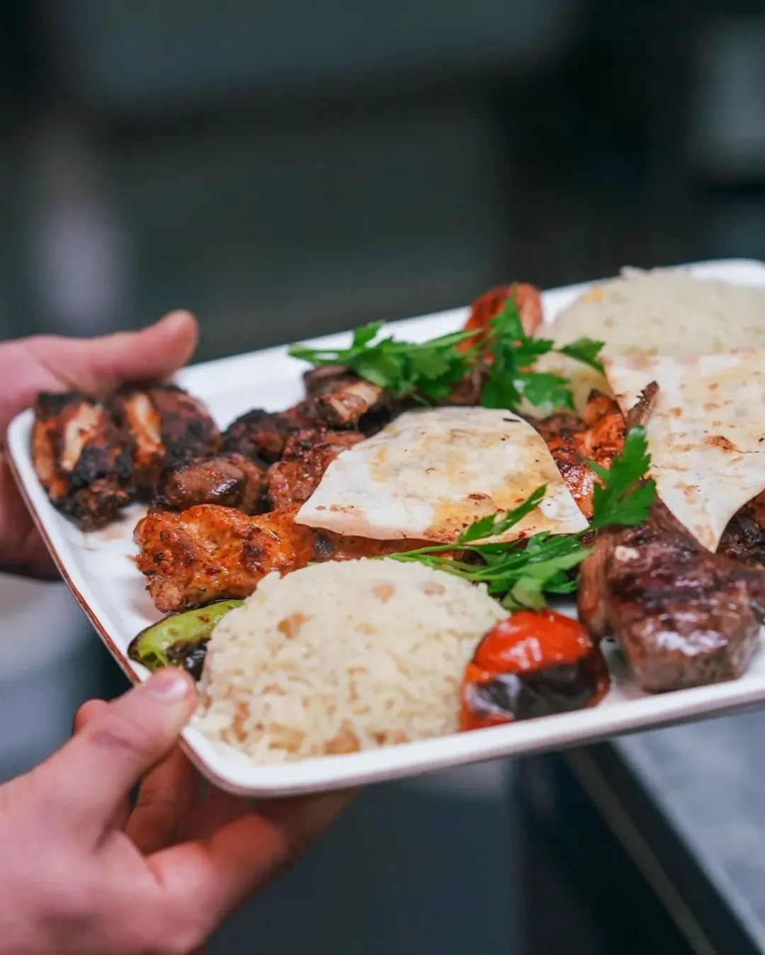 Mixed meat platter with flatbread and rice